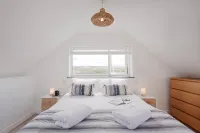 Spectacular one bedroom apartment , incredible coastal views, walk to the  beach