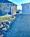 Adorable Beach house with lots of outdoor space and steps to Long Beach!