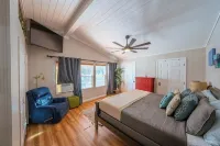 Luxury WATERFRONT home with HEATED POOL AND SPA Sleeps 28+