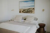 Stylish Coastal Getaway Steps from the Beach & Pier