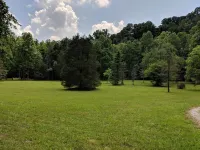 Our creekside cabin is nestled deep in the country on a secluded lane.