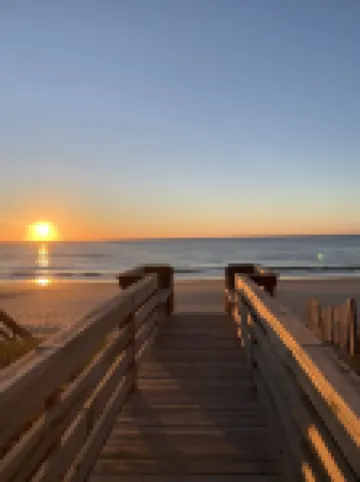 Not quite ocean front, but almost! Just a few steps to the sand! Pet friendly.