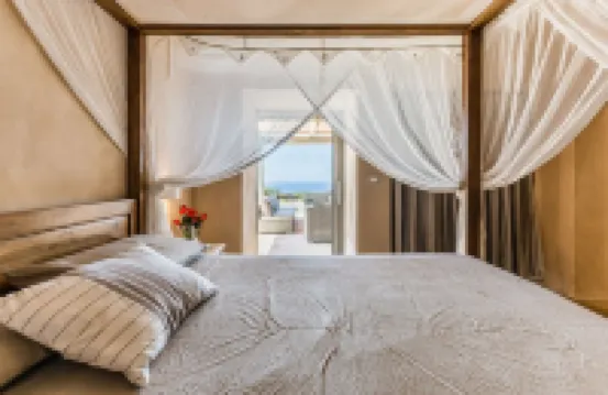 New structure with 3 dammusi, infinity pool and breathtaking sea view Hôtels à : Pantelleria