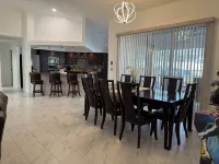 The Perfect Gateway Home with a large pool area, Gazebo, all fenced in.