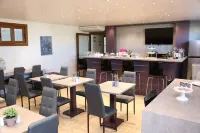 HOtello Guest Suites - breakfast