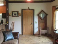 Restored rock house with hot tub and beautiful private deck.