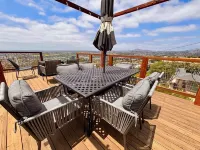 Mountain Top 4 Bdrm Home Along Nature Reserve with Spectacular Views, AC & WiFi