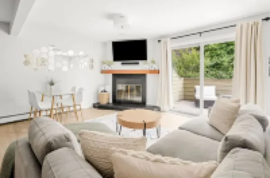 Two Balconies and Seasonal Community Pool - Bright and Airy Retreat