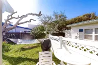 Dog-friendly bungalow with fenced yard - steps to the beach & fishing spots