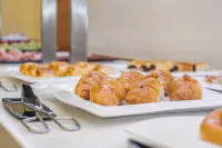 瑟拉斯柯絲莫斯公寓飯店 - 早餐