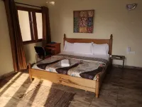 The Golden Apple Guest House Hotels near Tesano
