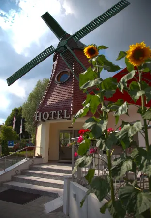 Hotel Restaurant Zur Windmühle Отели в г. Ансбах