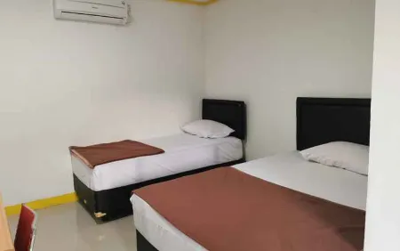 Hotel Mustika 2 Отели в г. Танджунгпандан