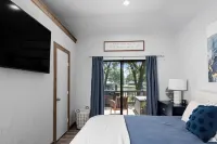 Dock, Fire Pit & Fenced Yard at Lakefront Retreat