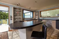 Akaroa Holiday Home.  Spacious, sunny, harbour views and close to town. Sleeps 8