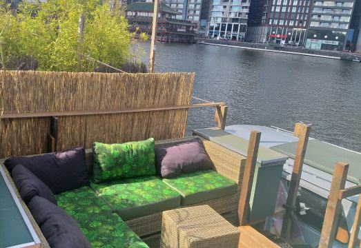 Boat with a view in center of Amsterdam