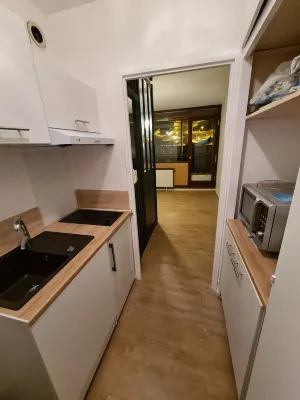 At the foot of the ski resort with a view of the slopes