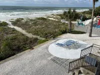 Quiet Beach Front View with Direct Access to Sand