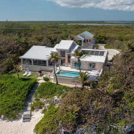 Coral Loft 4BR + 1 BR Oceanfront Villa w/ Private Pool & Beach in Grand Cayman