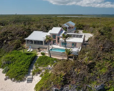 Coral Loft 4BR + 1 BR Oceanfront Villa w/ Private Pool & Beach in Grand Cayman Hotels in North Side