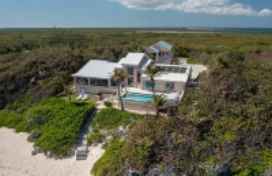 Coral Loft 4BR + 1 BR Oceanfront Villa w/ Private Pool & Beach in Grand Cayman