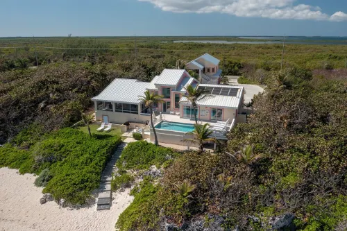 Coral Loft 4BR + 1 BR Oceanfront Villa w/ Private Pool & Beach in Grand Cayman