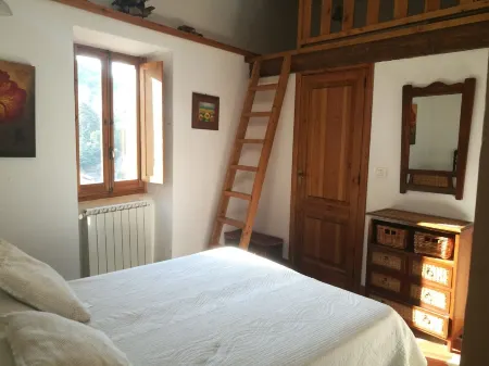 Town house with a terrace and fire place in Scanno.