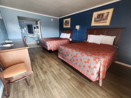 Guest House Motel Отели рядом с достопримечательностью «Powers Museum»