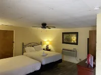 JI6, King Guest Room at the Joplin Inn at entrance to the resort by RedAwning - balcony