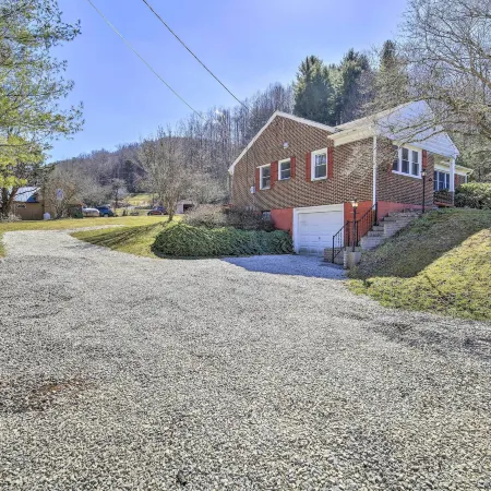 Quaint Creekside Home w/ Spacious Deck & Yard