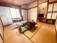 Oshima Hot Spa Hotel فنادق في أوشيما