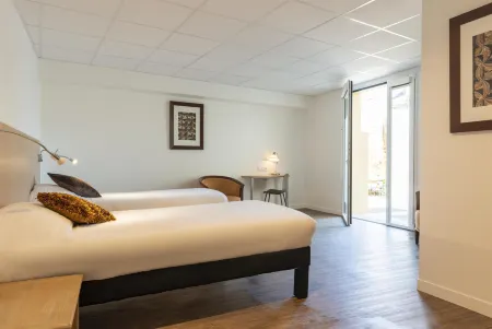 The Originals City Hôtel Chantecler le Mans Отели рядом с достопримечательностью «Home of Adam and Eve»