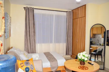 Spacious studio unit in Ruiru: peaceful & secure with free parking & fast wifi