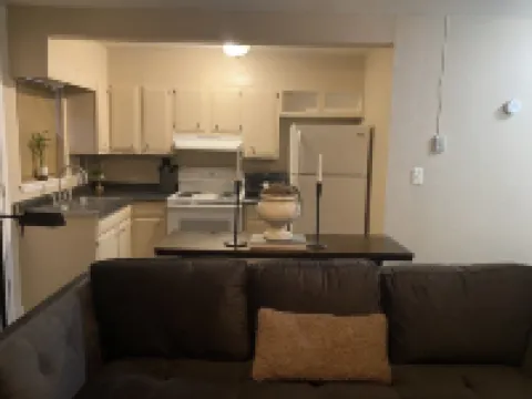 Cozy retreat half a mile away from the Beach set amidst peaceful tropical garden