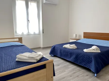 Apartment 100 mt from the beach Lido di Alghero, bright, wifi, balcony