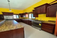 Nature view in a quiet urban neighborhood 1-bedroom house with WiFi and AC Hotels in Corozal