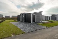 Chalet with Fireplace near Oosterschelde