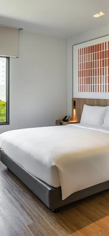 ห้องมาตรฐานพร้อมเตียงคู่ 1 เตียง