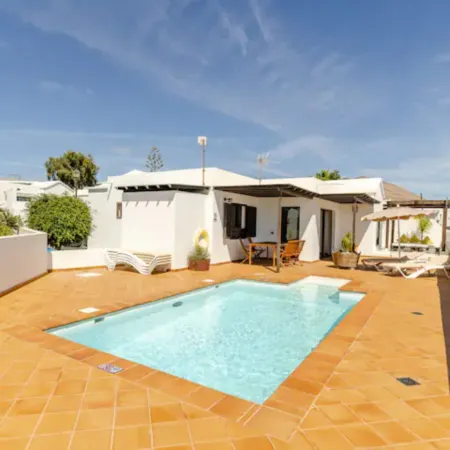 Villa with lounge area and private pool