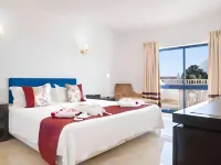 Grand Muthu Oura View Beach Club Hotels near برج الساعة ألبوفيرا