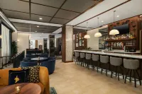 The Peregrine Omaha Downtown Curio Collection by Hilton - bar