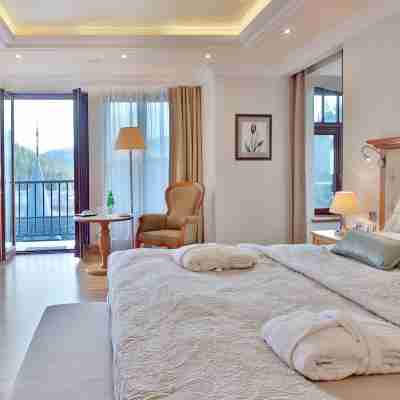 Retro Riverside Wellness Resort Rooms