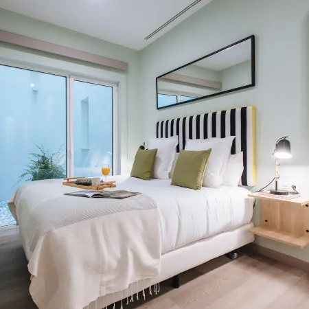 Sercotel Sevilla Guadalquivir Suites Отели рядом с достопримечательностью «Макарена»