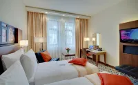 Radisson Rosa Khutor (Рэдиссон Роза Хутор) Отели рядом с достопримечательностью «Каро-фильм, кинотеатр»