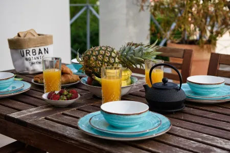 Tessera Villas & Studios Collection Отели в г. Гувья