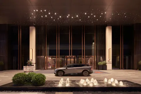 Tianjin Marriott Hotel National Convention and Exhibition Center Отели рядом с достопримечательностью «Tianjin Occupation Skill Public Training Center Gymnasium»