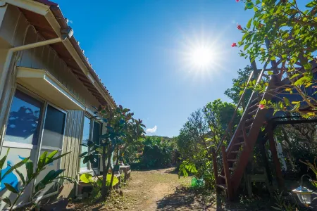 Hide A Way - Tanegashima Sunset Retreat - Отели рядом с достопримечательностью «Nishinoomote port offshore Breakwater north Lighthouse»