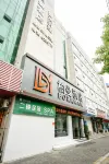 Borrman Hotel (Xinyang Shihe district government store) Hotel in zona Shihe Park