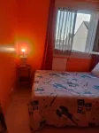 An orange room number 2 Hotels near RageBoat
