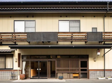 Tosaya Ryokan Отели в г. Асакути